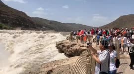 Spectacular Hukou Waterfall on Yellow River in full flow after rainfalls
