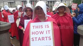 Trump state visit to UK brings women dressed as characters from 'Handmaid's Tale' to the streets