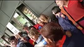 Pop up choir sing We are Together at Anti Trump Rally