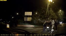 Dashcam captures taxi driver and pedestrians rushing to aid fallen motorbike rider
