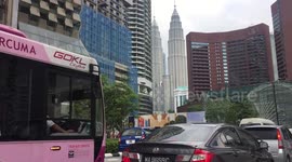 Iconic Petronas Twin Towers View from the Road in KL City