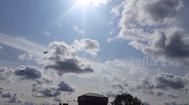 Three Boeing Chinook fly over north London