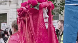 Protesters in red at the anti Donald Trump protest in London