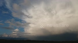 Dramatic evening thunderstorm clouds with mammatus