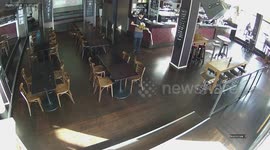Raw CCTV footage of New Zealand bartender hilariously dropping a tray holding several pints of beer