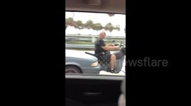 Florida man spotted riding half-car half-bike vehicle on highway