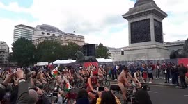 Crowds gather at London’s Trafalgar Square to welcome naked cyclists