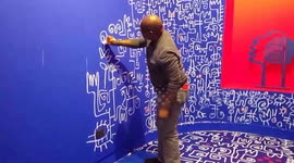 Nigerian artist Victor Ekpuk adds finishing touches to show in London