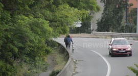 Cyclists lost on the highway (autoroute) of Paris suburbs (Saint-Denis). Two girls lost on the freeway . Porte de Paris. 9june2019