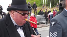 Churchill impersonator delights D-Day crowds in Port en Bessin, Normandy, France