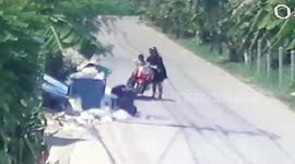 Shocking moment Thai mother dumps newborn baby in dustbin then rides away on moped