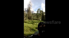 Residents flee in panic as Mount Sinabung erupts in Indonesia