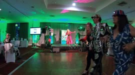 Dolly Parton impersonator sings variety of songs at charity event