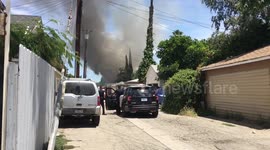 House, cars engulfed in Flames