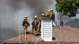 LAFD fights flames at a Reseda home