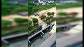 Flash floods cause massive landslide which sweeps away vehicles in southern China