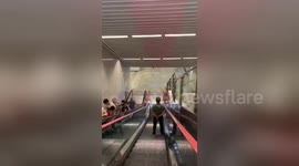 Watch commuters descend into China’s deepest subway station which is 31 storeys below the ground
