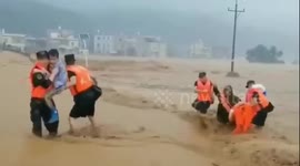 Firefighters rescue people trapped in flash floods after strong rainstorm in China