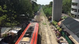 Passing train in central Bangkok