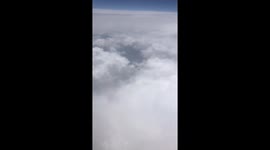 Flying over a B-2 bomber.