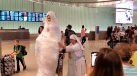 Virgin Mary wheeled around LAX