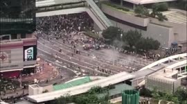 Hong Kong police fire tear gas into crowd of protesters