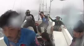 Thai fishermen battle through raging seas