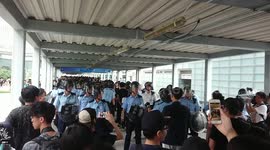 Hong Kong riot police retreat in face of demonstrators during extradition bill protest