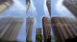 Chinese residential community sprays water from skyscrapers to combat heat wave