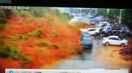 Terrifying moment massive landslide wipes out parked vehicles in China's Fujian