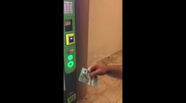 Purchasing a drink from a vending machine