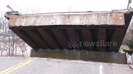 Dramatic video of truck stuck on washed out bridge in severe flooding in Port Bruce Ontario in February 2018