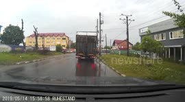 dashcam - car hits the road sign
