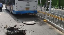Manhole explodes underneath bus causing windows to shatter in China's Wuhan