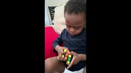 Genius three-year-old boy solves his first Rubik's Cube
