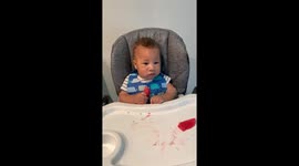 Baby’s first time with watermelon