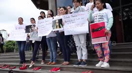 Bolivian activists place shoes outside court in protests at sexist killings