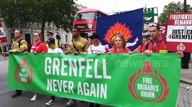 Marchers stream past Downing Street calling for justice for Grenfell