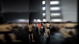 Shirtless residents flee out of buildings after 6.0-magnitude earthquake hits China's Yibin