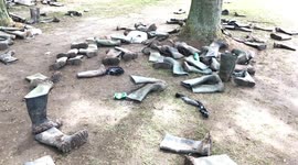 Thousands of wellies left abandoned in fields following Download Festival in England