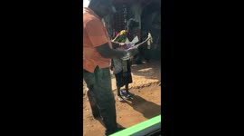 African woman receives shoes for the first time in her life
