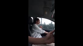 Funny video of a man sneaky selfie recording a girl who singing in the car