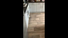UK resident shows flooding damage at his house in Lincolnshire town