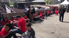 VIPs take cover on elevated walk way after Toronto Raptors Parade shooting