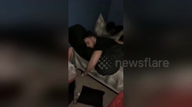 Drunk man dances lying in bed thinking he’s still at the club