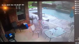 'Table needed cleaning anyway!' Texas storm blows garden furniture into pool