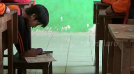 little girls are born without hands, but are good at writing with their feet