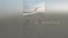 Ryanair workers caught on camera playing 'cone flip' game on runway at Prague airport