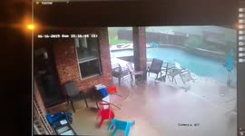 'Table needed cleaning anyway!' Texas storm blows garden furniture into pool