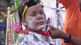 Ladies in Thailand getting deep facial massage treatment using strings